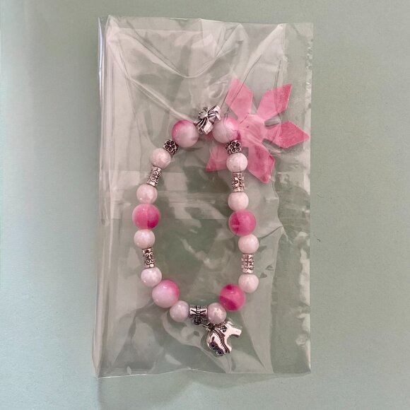 Handmade bracelet with beads and dangling elephant charm - Picture 2 of 7